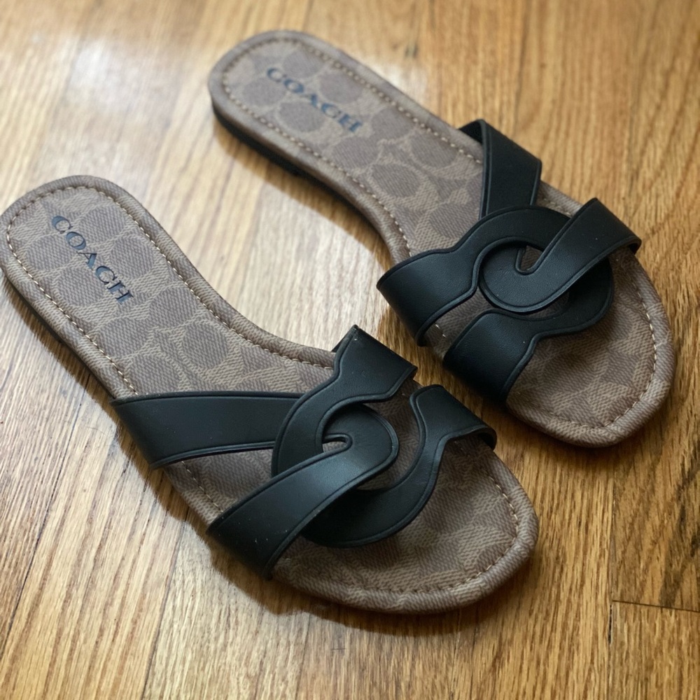 Black coach sandals.